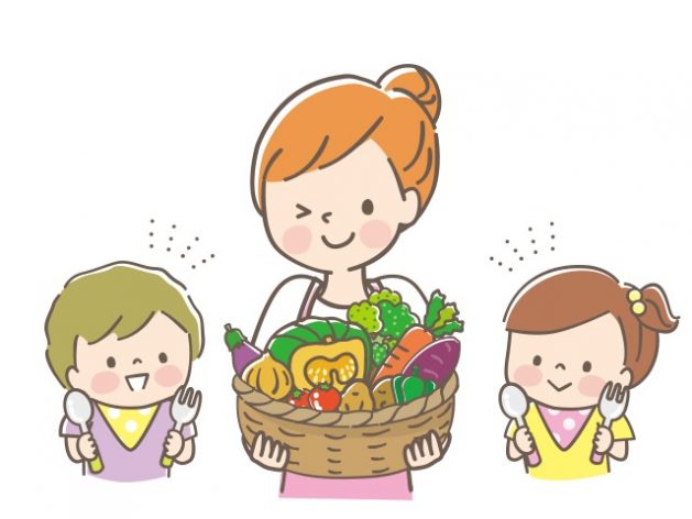 野菜を持つお母さんと子ども